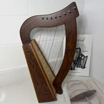 Roosebeck Lily Harp 8-string Knotwork Extra Strings Tuning Key Great Condition. Fixed Price $58.99.
